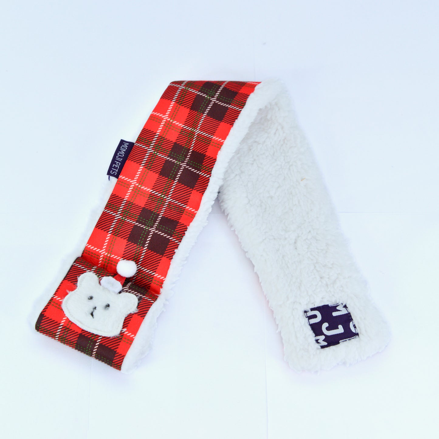 Beary Christmas red tartan scarf laid flat, showing the sherpa lining