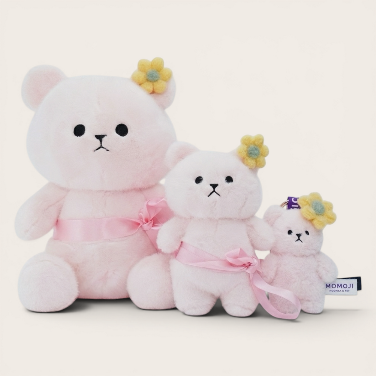 Pink Momoji Bear plush family in three sizes with bows