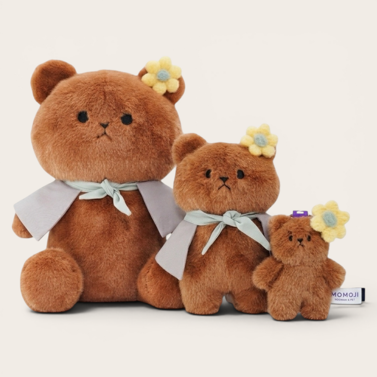 Brown Momoji Bear plush family in three sizes with capes
