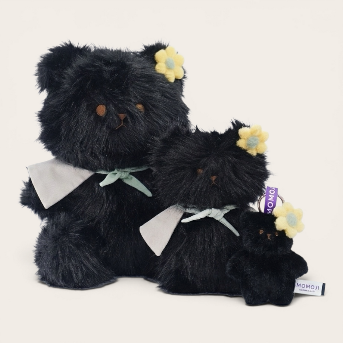 Black Momoji Bear plush family in three sizes with capes