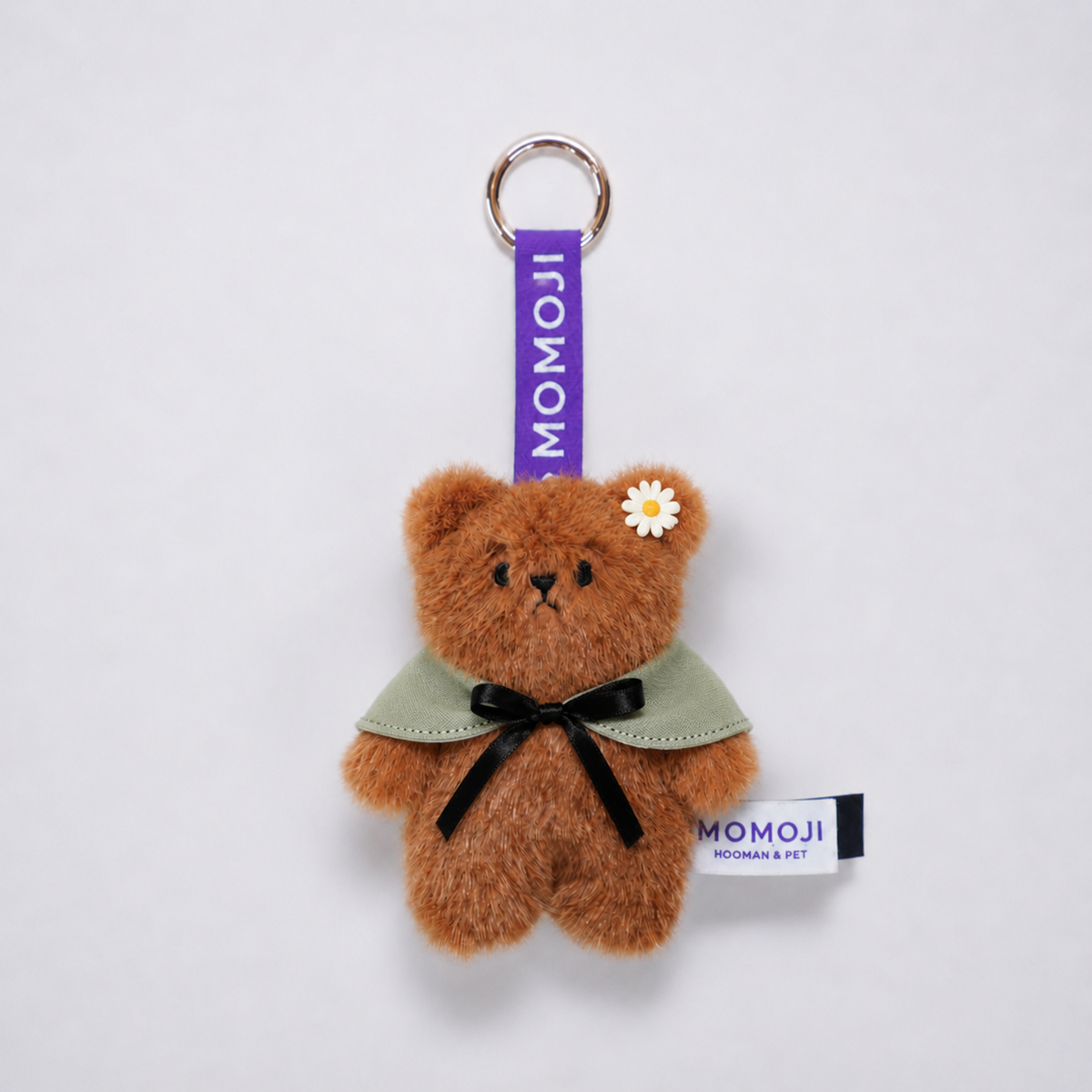 Brown Momoji Bear keyring with green cape and flower clip