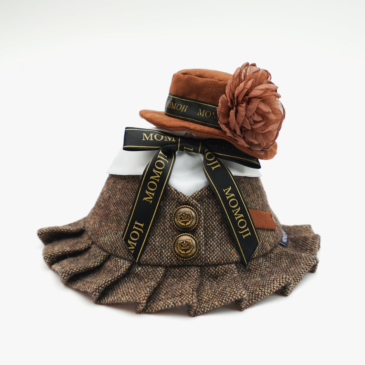 Piccadilly rose hat resting on the tweed bandana